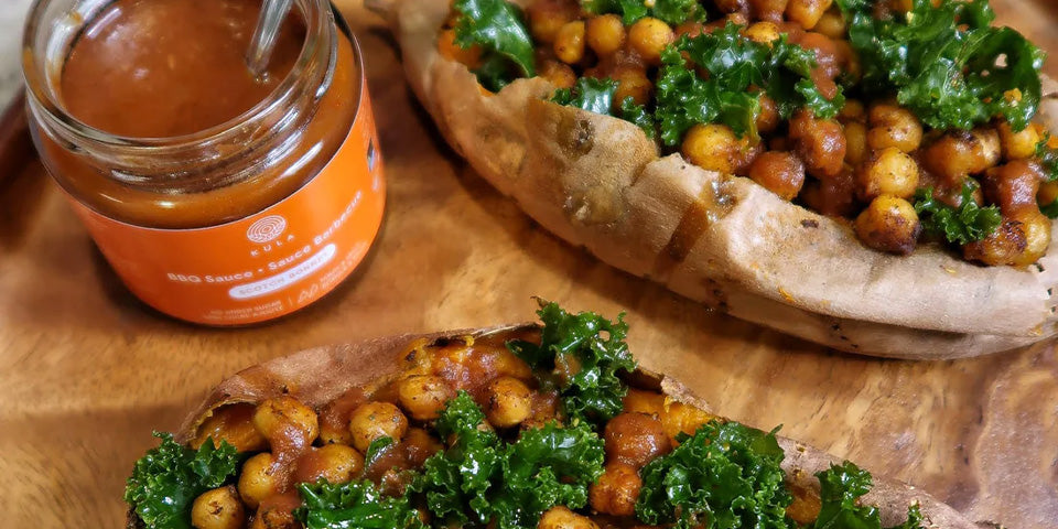Jerk Chickpea Stuffed Sweet Potatoes with massaged kale